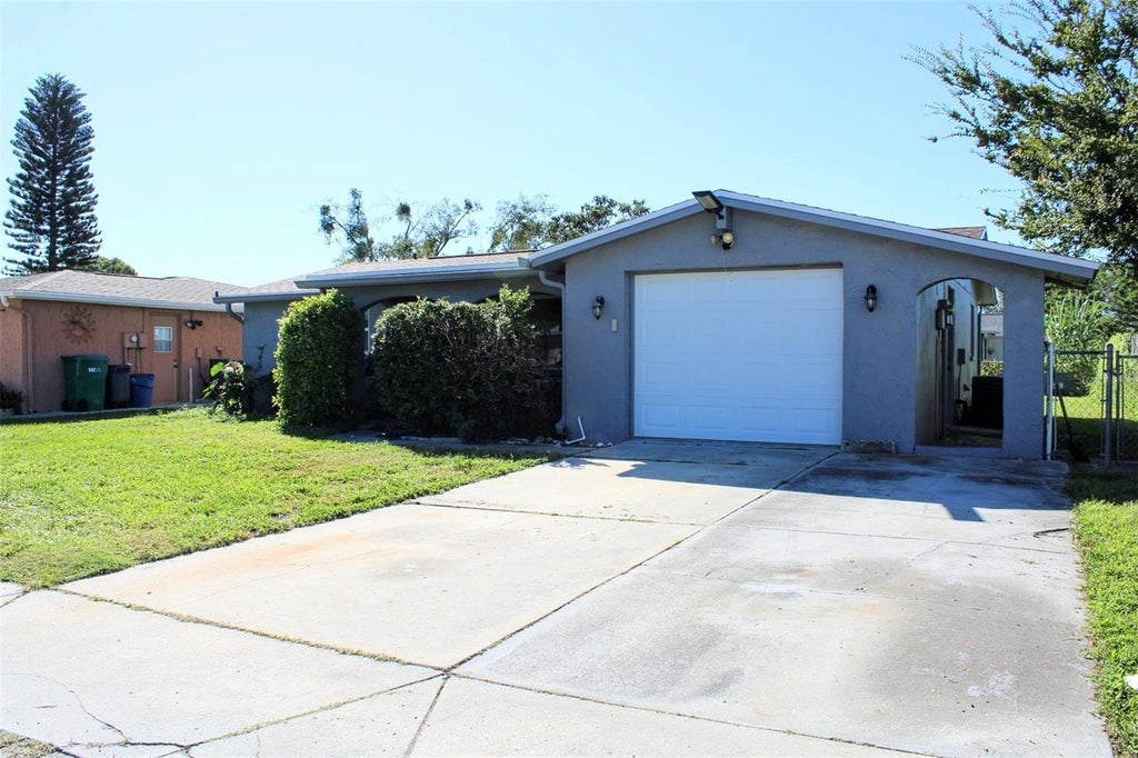 Photo of 7234 Westcott Drive, Port Richey, FL 34668 (MLS # TB8560802)