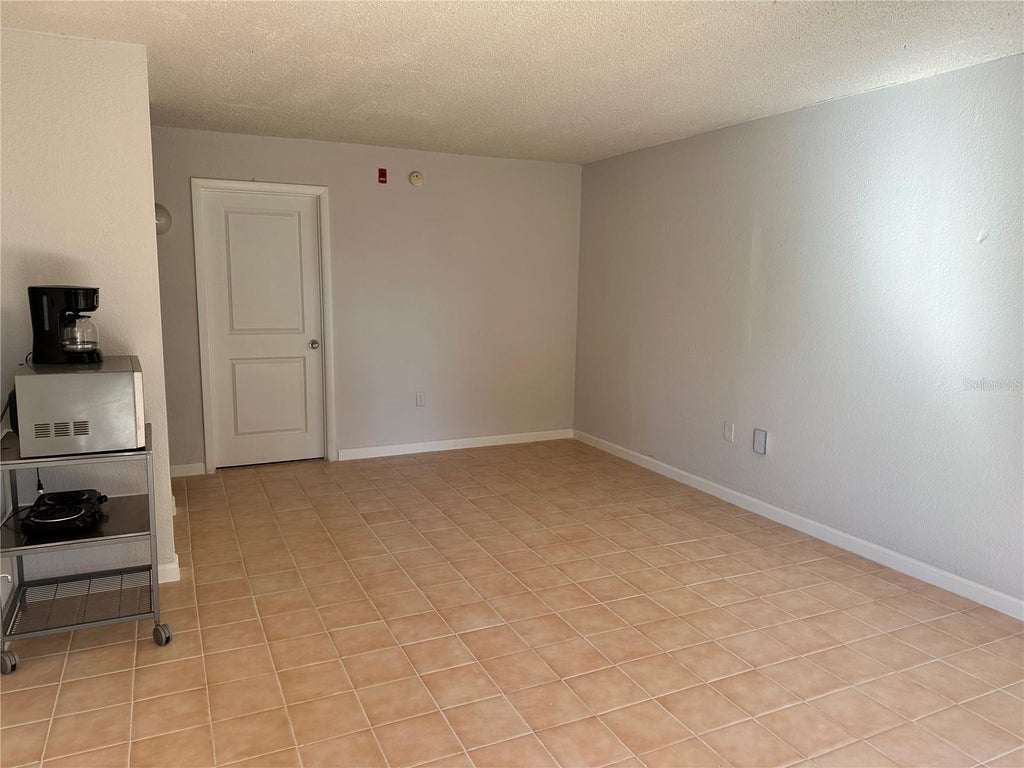 Photo of 8421 S Orange Blossom Trail #443, Orlando, FL 32809 (MLS # O6422248)