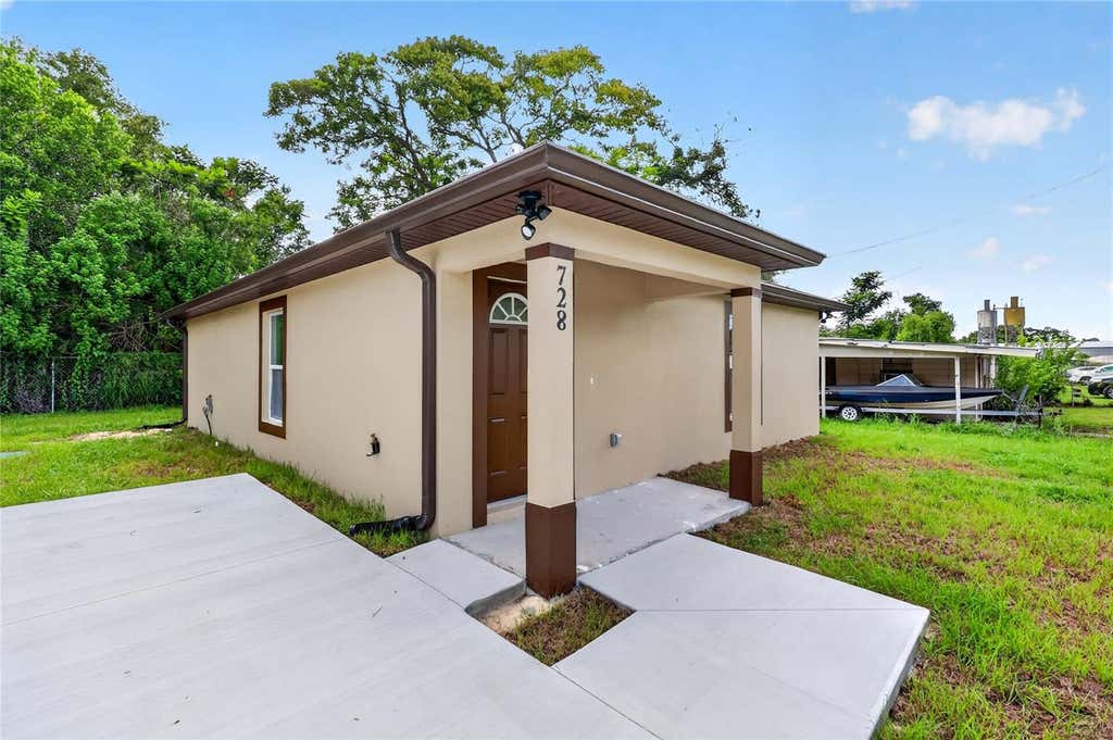Photo of 728 Henry St, Auburndale, FL 33823 (MLS # S5154105)