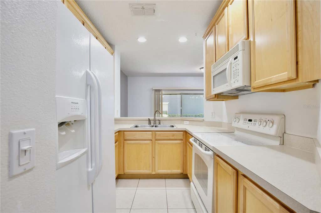 Photo of 10412 Kiplinger Lane #236, Orlando, FL 32829 (MLS # O6427197)
