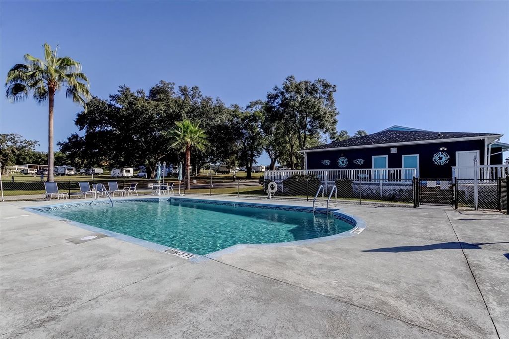 Photo of 10151 Hamp Drive, Dade City, FL 33525 (MLS # TB8446247)