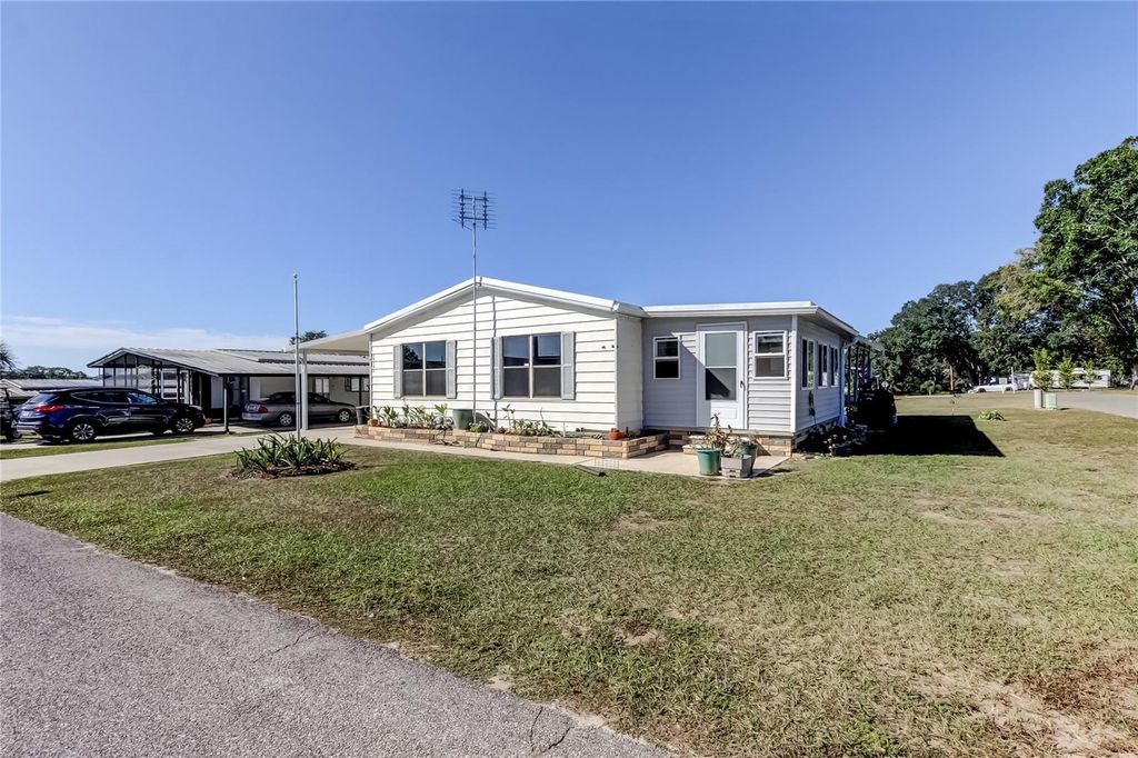Photo of 10151 Hamp Drive, Dade City, FL 33525 (MLS # TB8446247)