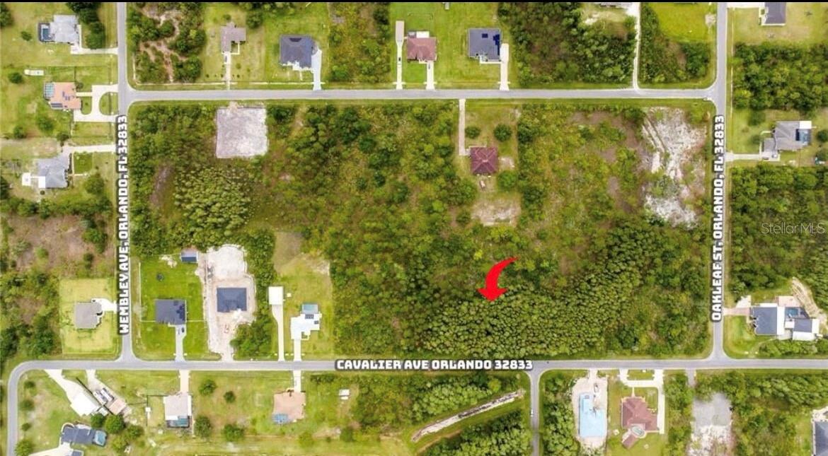 Location! Location! Location! This is an amazing 150' X 300' 1.03-acre land located in the upscale area of Wedgefield, less than 20 min drive from Orlando Airport. This sought-after Golf and Cavalier Community offers the perfect setting to build your dream home. The location is incredibly convenient, being within 30 minutes of Downtown Orlando, I-95, Cocoa Beach and the famous Orlando theme parks. Short drive to Hwy 528 and UCF. Additionally, the Lake Nona Medical Center is easily accessible from here and on short drive. Wedgefield boasts numerous recreational facilities, including a top-notch golf course and country club with a restaurant and bar, bicycle lanes, and a community park. For nature lovers, the Hal Scott Preserve and Park, sprawling across 9,000 acres on two sides of Wedgefield, ensures that this area remains a peaceful oasis amidst Orlando's rapid development. Visitors can enjoy nature trails for hiking and horse riding in the Hal Scott Preserve. Buyer must perform due diligence and verification.