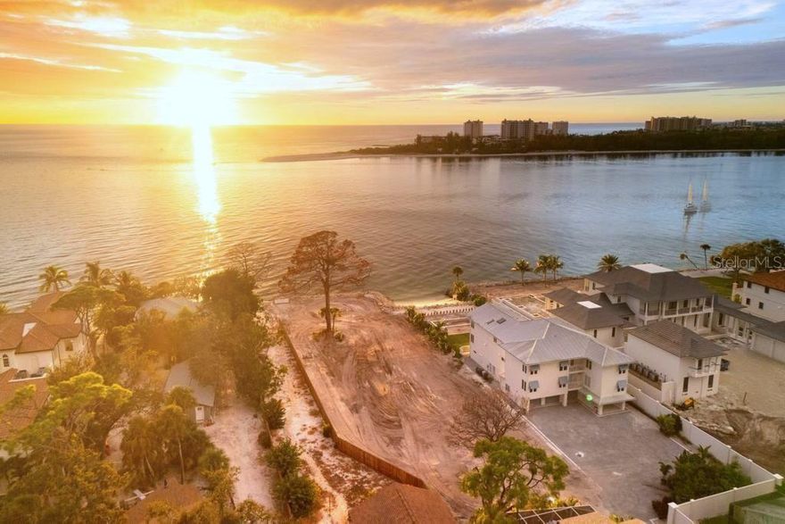 A rare Gulf-front offering, this 37,471 sq. ft. (.86-acre) parcel presents an extraordinary opportunity to create a signature coastal estate in one of Sarasota’s most coveted locations. Just steps from the sparkling waters of the Gulf of America and the Sarasota Bay, the nearly one-acre homesite provides a generous canvas for architectural vision—whether a sleek modern retreat, a timeless Mediterranean, or a resort-inspired sanctuary. This land has been fully prepped and made ready to build a New Construction home of your dreams. M&J Pham Development is the preferred builder, who has already created a conceptual blueprint for this property. The seawall has been reinforced with massive boulders and ripraps, to add extra protection and security to give the new homeowner peace of mind.

The expansive lot allows for grand-scale design, with the potential for sweeping outdoor living spaces, infinity-edge pool, multiple terraces, and lush private gardens. From sunrise walks along the shoreline to breathtaking Gulf sunsets, every hallmark of coastal living is at your doorstep. Perfectly situated, the property blends serenity with convenience—only moments from world-class beaches, fine dining, boutique shopping, marinas, golf, and Sarasota’s vibrant cultural scene.

Opportunities of this caliber are exceedingly rare. For the discerning buyer seeking both prestige and enduring value on the Gulf, this property is ready to bring your vision to life.