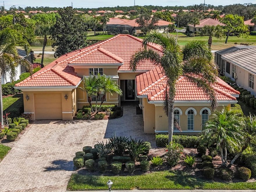 Perfectly positioned along the golf course, this elegant pool home offers refined Florida living in one of Venice’s most sought-after communities. A brand-new roof installed in September 2025 provides immediate value and peace of mind.

Inside, you’ll find formal living and dining spaces, soaring ceilings, and refined architectural detailing that create a sophisticated yet welcoming atmosphere. Expansive pocketing glass doors fully retract to open the home to the spacious screened pool area overlooking the manicured fairways—creating a seamless indoor-outdoor experience that truly embraces the Florida lifestyle.

The kitchen serves as the heart of the home and features natural gas for cooking. The kitchen opens to the family room, making it ideal for entertaining or everyday living. The open floor plan provides both comfortable gathering spaces and an effortless flow.

The primary suite is a private retreat with French doors leading to the pool, a tray ceiling with crown molding, abundant windows inviting natural light, dual walk-in closets with a custom organizer, a soaking tub, walk-in shower, and dual vanities.

A split-bedroom layout places two generously sized guest suites on the opposite side of the home, providing privacy for family and visitors.

Meticulously maintained and move-in ready, the property also offers a two-car garage plus a separate single-bay garage—perfect for your golf cart or additional storage.

Residents enjoy access to the clubhouse amenities, while golf membership is optional and available for an additional fee. The Tuscan-inspired clubhouse offers fine and casual dining, six Har-Tru tennis courts, three pickleball courts, a state-of-the-art fitness center with professionally led classes, a three-lane lap pool, resort-style pool and spa, and a poolside Tiki bar. Nature lovers will appreciate the 74-acre park with scenic boardwalk trails for wildlife and birdwatching. Golf enthusiasts may choose to join the 18-hole, par-72 championship course designed by Chip Powell.

This gated community is conveniently located near shopping and just minutes from the beaches of Venice Island and Casey Key, this home delivers luxury, lifestyle, and location in one exceptional offering.