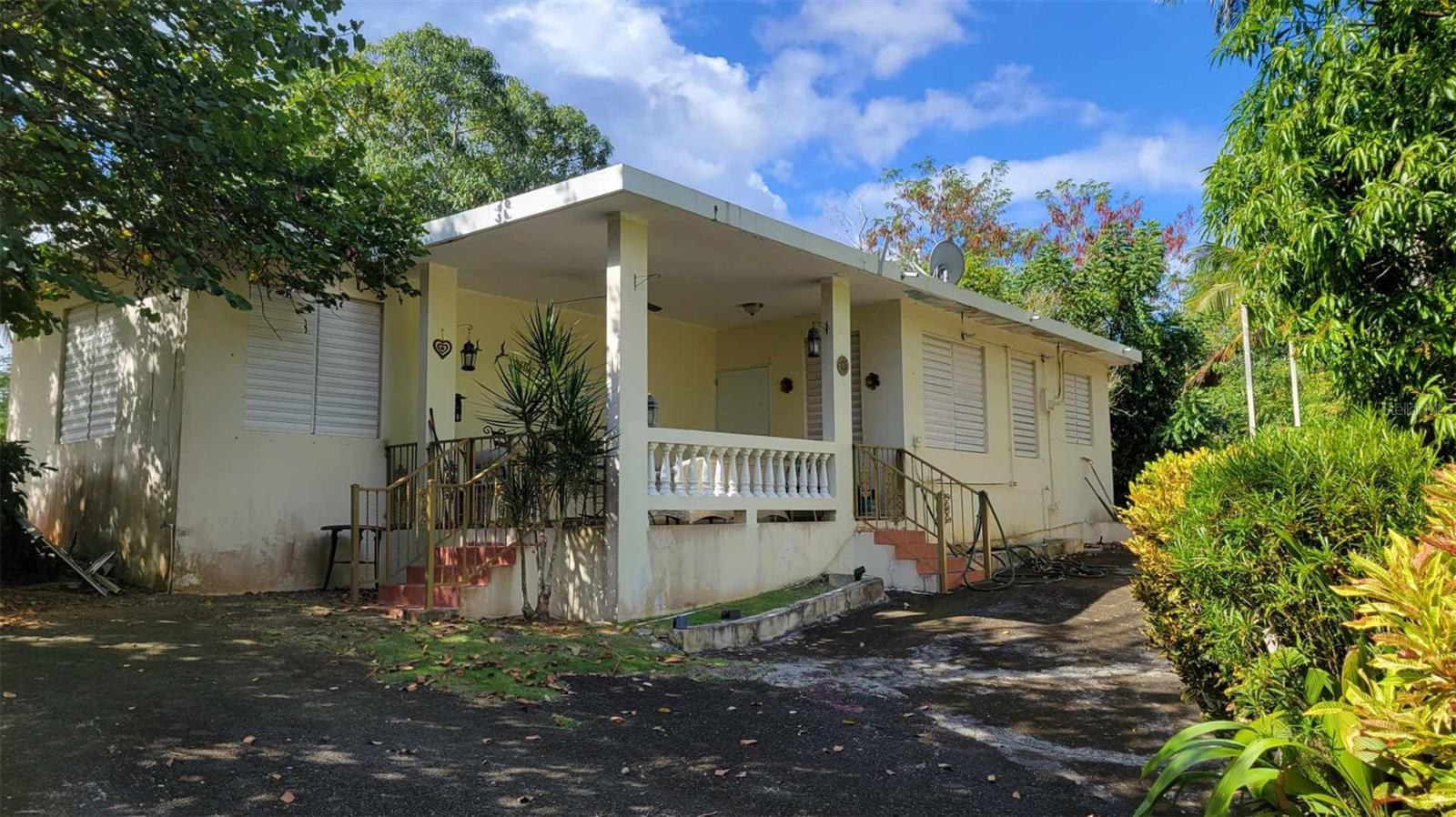 Beautiful Country House with 1.5 cuerdas (1.48 acres) in Bo. Minillas Carr. 102 Km 38 in San Germán, Puerto Rico. This beautiful property consists of 3 bedrooms, 1 bathroom, balcony, terrace style, living/dining room and kitchen with private entry and parkings. Coordinate your appointment by calling today. Don't miss this great opportunity.