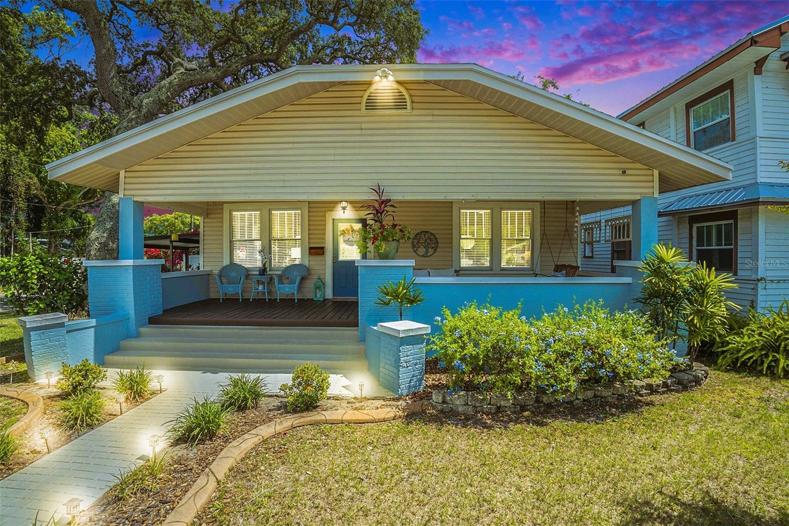 Welcome to Your Urban Sanctuary in the Heart of Old Seminole Heights
This stunning, fully renovated Craftsman bungalow is the perfect blend of timeless charm and modern luxury, located in one of Tampa’s most desirable neighborhoods. From the moment you arrive, you’ll be captivated by the oversized front porch—ideal for sipping your morning coffee or relaxing in the evening on the large swing.
Step inside to an open-concept floor plan designed for effortless entertaining, featuring high-end finishes throughout. Original pine hardwood floors have been beautifully restored, and the elegant fireplace is framed by custom built-in shelving, adding warmth and character to the living space.
The brand-new gourmet kitchen is a chef’s dream, equipped with stainless steel appliances, Cambria quartz countertops, designer lighting, and custom cabinetry. A spacious butler’s pantry includes a beverage cooler and generous storage, making hosting a breeze.
No detail has been overlooked in this carefully curated home. The expansive layout includes three bedrooms, a dedicated office, and over 2,000 square feet of living space. The home sits on a corner lot with a rare two-car side by side carport, offering covered access to the side entry near the kitchen and dining area.
Prepare to be amazed by the master suite—nearly 600 square feet of pure luxury. The spa-like bathroom is straight out of a magazine, featuring a clawfoot tub, massive walk-in shower, dual vanities, an eye-catching cement tile feature wall, a statement chandelier, and a private water closet. The master also includes a custom walk-in closet with extensive built-in shoe storage.
The additional bedrooms are generously sized, filled with natural light, and offer ample closet space. The second bathroom continues the home’s period charm, with a pedestal sink, deep soaking tub, and elegant chandelier.
Beyond the beautiful aesthetics, this home offers peace of mind with structural upgrades done by LRE, a new roof, new HVAC system, a natural gas water heater in 2020, and a brand-new vinyl privacy fence in 2024. There’s also a separate office with a built-in desk and shelving, and an oversized laundry room complete with a utility sink.
Located within walking distance to some of Seminole Heights’ best restaurants, breweries, and local shops, including the C House, Rooster & the Till, 82 West Distilling, Ology Brewing, Revolution Ice Cream, Front Porch, Mandarin Heights and new to the area, the Salty Donut, this extraordinary home offers both comfort and convenience, and was once featured in the Old Seminole Heights Home tour in 2017.
Don’t miss the opportunity to own this thoughtfully designed dream home in one of Tampa’s most vibrant communities!