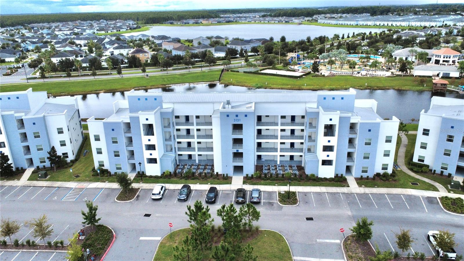 Welcome to your new in a beautiful resort-style condo inside a gated community just minutes from Disney! This 3rd-floor condo offers a bright, inviting space with access to incredible amenities including a water park with slides, a resort-style pool, sand volleyball, basketball courts, and more. Whether you’re looking to relax poolside or stay active, this community has it all. Perfectly located near dining, shopping, and entertainment, this condo combines comfort with convenience.