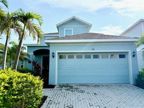 Photo of 319 Shore Crab Way, Apollo Beach, FL 33572 (MLS # TB8534622)