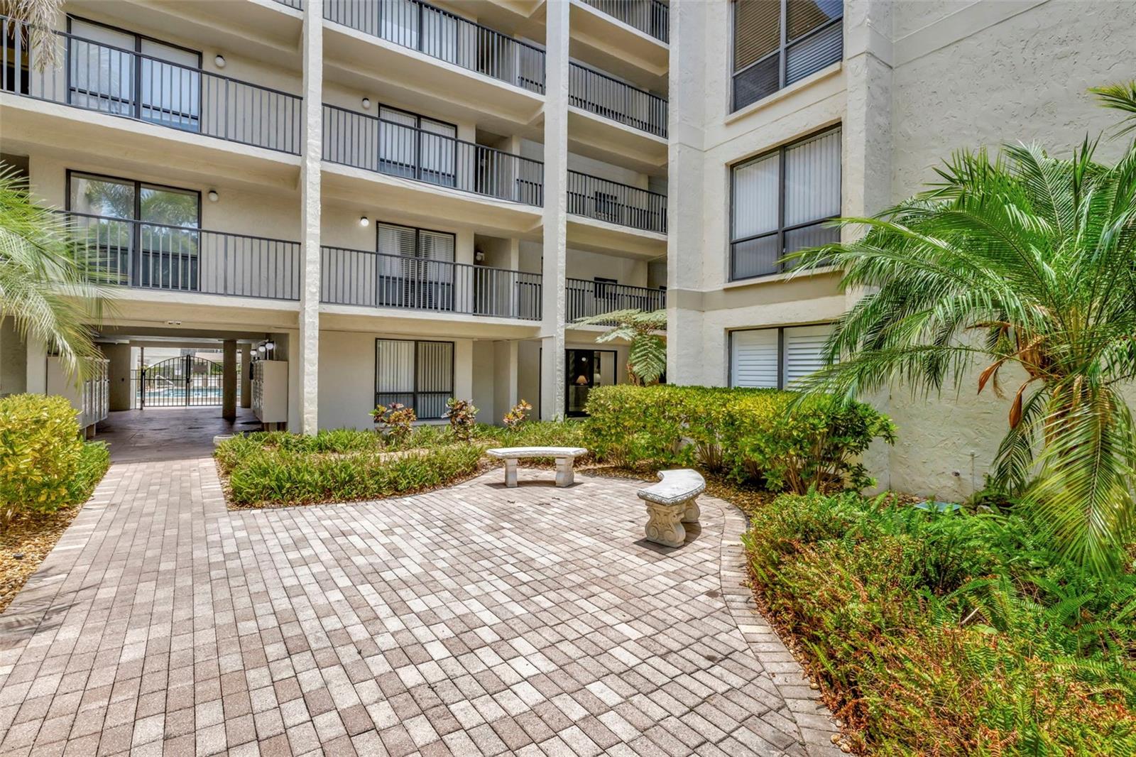 Elevated Living on the 4th Floor! Discover this well appointed 1-bedroom, 1-bath condo just minutes from the world-renowned Siesta Key Beach. This TURN KEY residence offers the ideal blend of relaxed Florida living and exceptional value. Step into a bright and airy space where natural light pours into the east-facing screened balcony, overlooking lush tropical landscaping. The interior features ceramic tile flooring throughout the kitchen, dining, and living areas, creating a clean and cohesive look. The kitchen is equipped with stainless steel appliances, including a range and dishwasher, and boasts a generous walk-in pantry for all your storage needs. A separate large closet provides ample space for beach and pool gear. Residents and guests enjoy access to a host of amenities including a community pool, tennis courts, social room, and fishing pier. Recent updates include a brand-new water heater and a newer A/C system for added peace of mind.
Best of all, this gem allows for weekly rentals, offering a fantastic opportunity to offset ownership costs. Gross rental income ranging from $30,000 to $40,000 annually. Great place to vacation when you can...and rent when you can't! The unit includes one assigned covered parking space, plus plenty of guest parking. Don’t miss out—schedule your showing today!