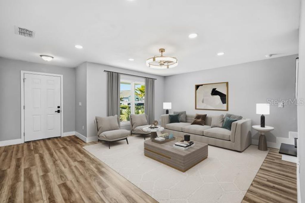 Photo of 728 Belvoir Drive, Davenport, FL 33837 (MLS # O6400057)