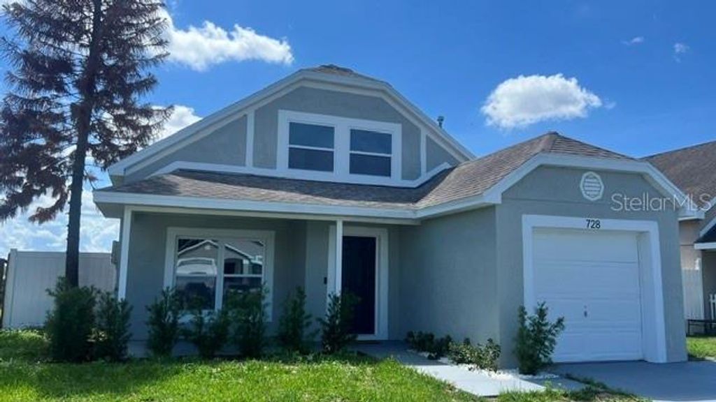 Photo of 728 Belvoir Drive, Davenport, FL 33837 (MLS # O6400057)