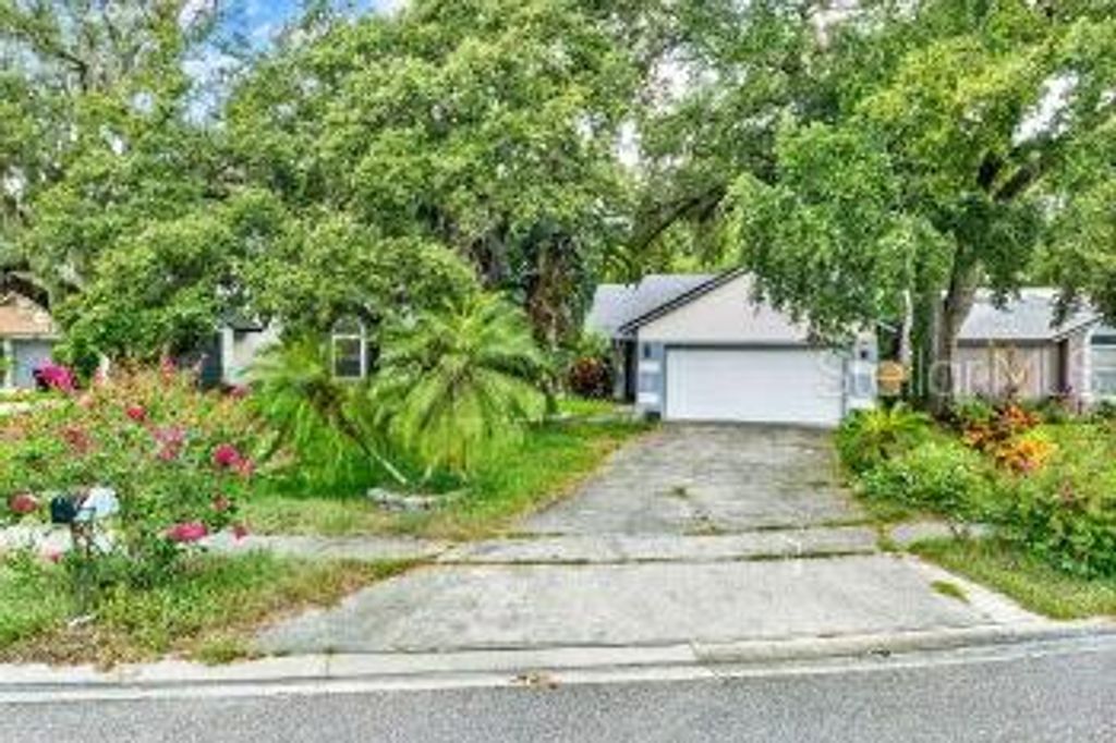 Photo of 5340 Old Oak Tree Drive, Orlando, FL 32808 (MLS # O6381035)