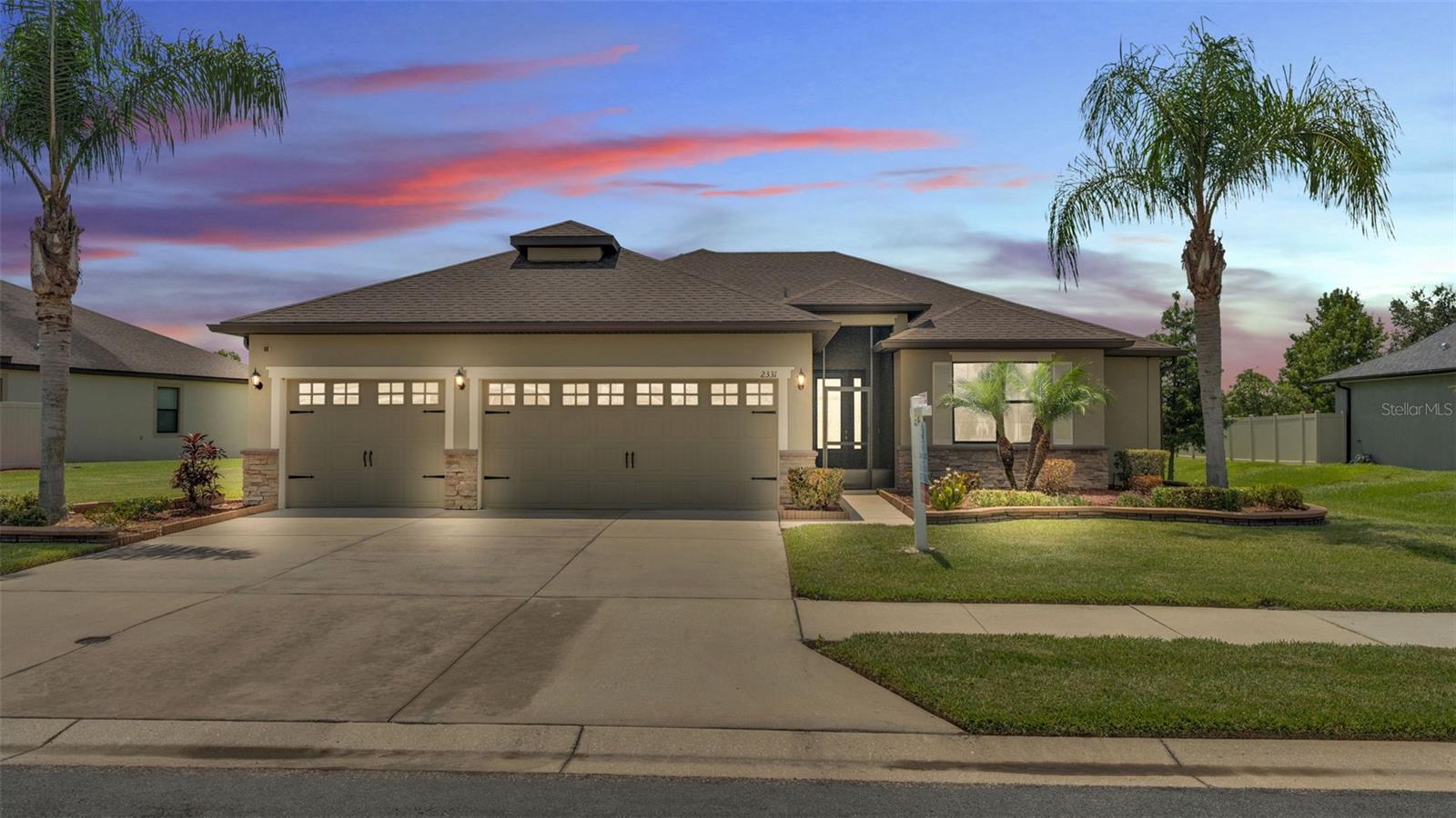 Welcome to this stunning 3-bedroom, 2-bath home located in the highly sought-after Bridgewater community in Lakeland. Boasting impressive curb appeal and soaring high ceilings, this spacious residence offers a perfect blend of comfort and flexibility.
Inside, you’ll find an open-concept living area filled with natural light, a modern kitchen, and a generously sized bonus lounge that was originally two additional bedrooms—easily convertible back to suit your needs.
The home also features a rare 3-car garage, ideal for extra storage, vehicles, or a workshop setup. The lawn has been meticulously maintained and ready for barefeet. The home has a huge screened patio with a great view of the water/lake. The primary bedroom is very spacious with a large en suite bathroom with a huge closet!
Bridgewater is known for its fantastic amenities, including a community fishing, pool, clubhouse, fitness center, tennis courts, playgrounds, and scenic walking trails. Conveniently located with easy access to I-4, shopping, dining, and more.
