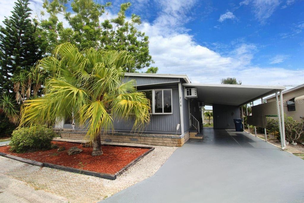 Photo of 716 49th Avenue W, Bradenton, FL 34207 (MLS # A4682053)