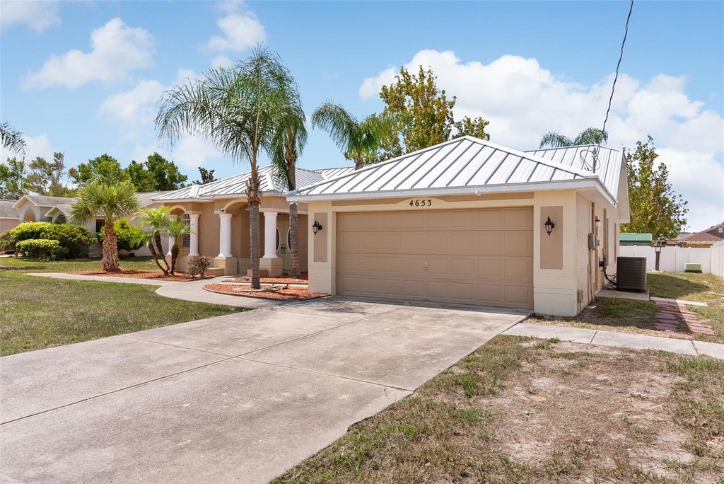 Photo of 4653 Mariner Boulevard, Spring Hill, FL 34609 (MLS # O6433677)