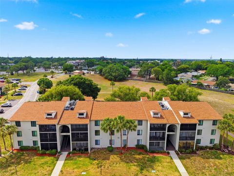 Photo of 1871 Pine Ridge Way W #B2, Palm Harbor, FL 34684 (MLS # TB8503302)