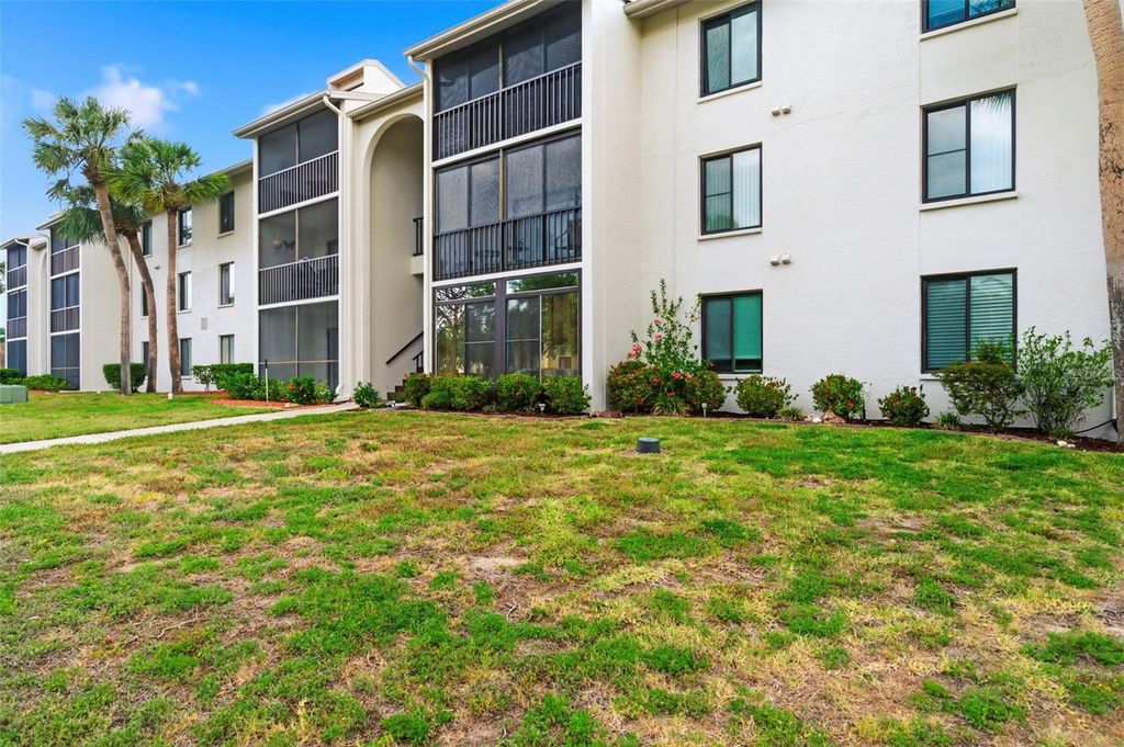 Photo of 1871 Pine Ridge Way W #B2, Palm Harbor, FL 34684 (MLS # TB8503302)