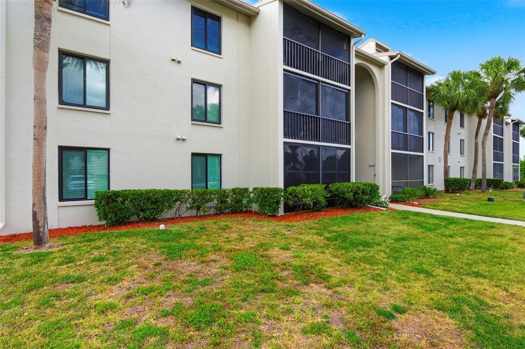 Photo of 1871 Pine Ridge Way W #B2, Palm Harbor, FL 34684 (MLS # TB8503302)