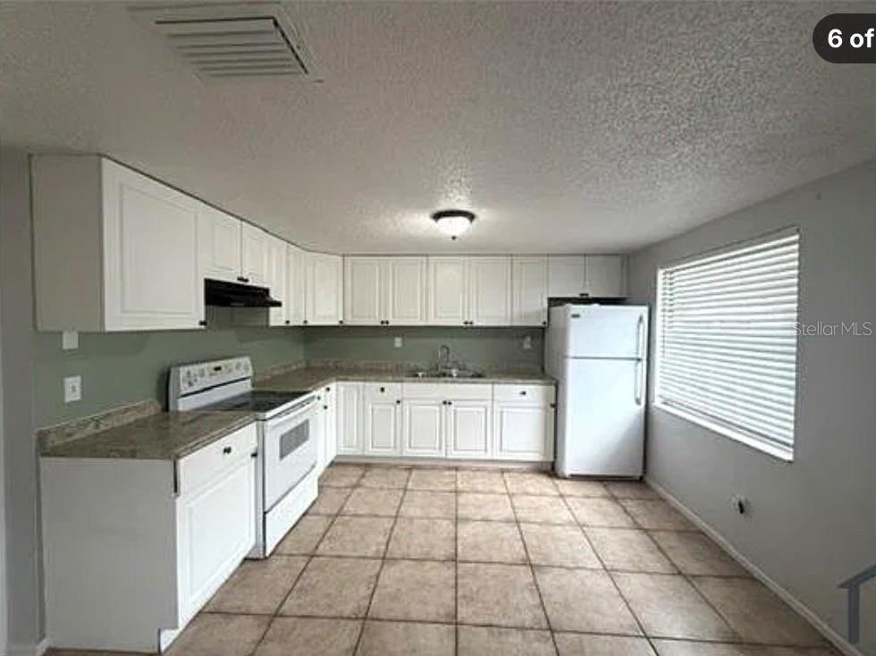 Photo of 1011 57th Avenue Terrace E, Bradenton, FL 34203 (MLS # TB8561153)