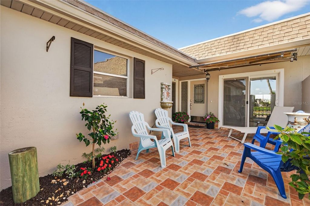 Photo of 427 Boca Ciega Point Boulevard N, St Petersburg, FL 33708 (MLS # TB8465670)