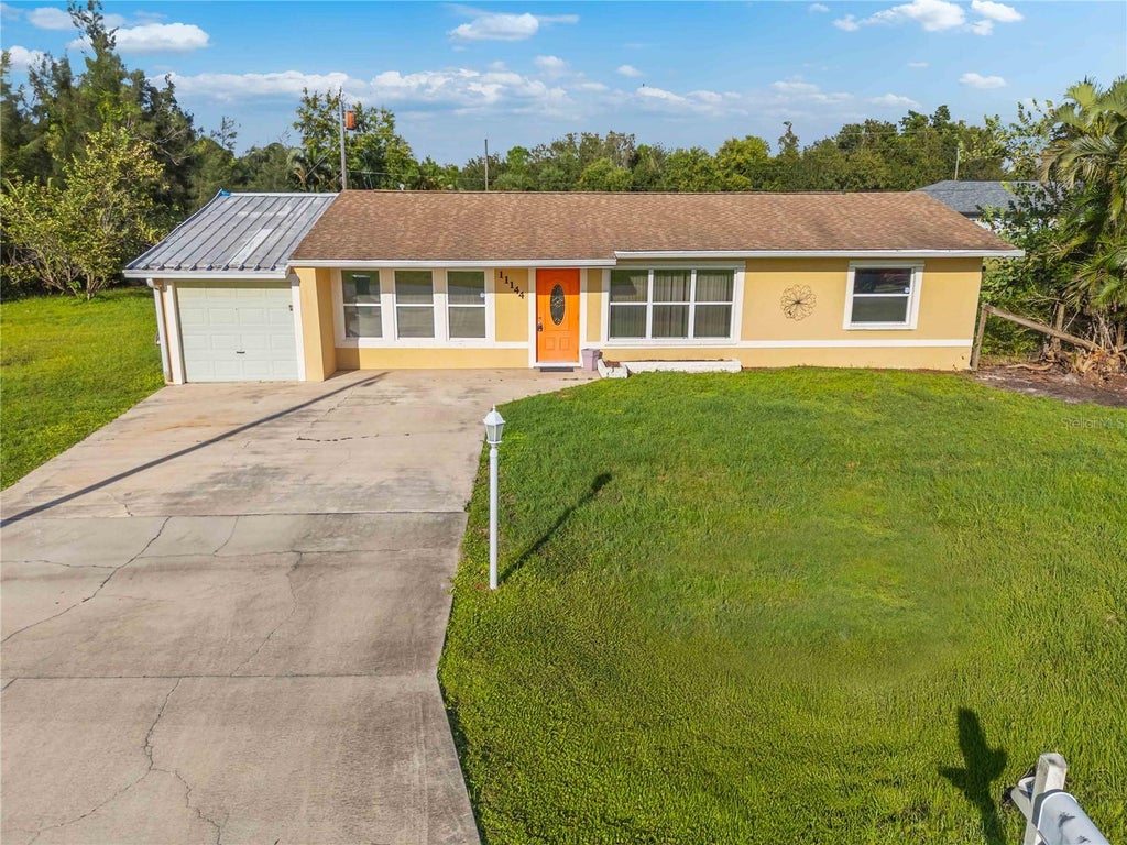Photo of 11144 3rd Avenue, Punta Gorda, FL 33955 (MLS # C7532141)