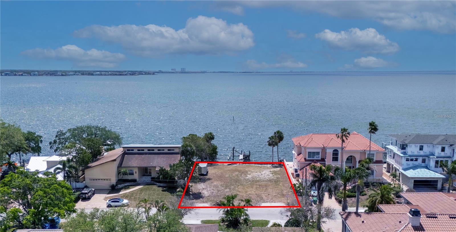 A rare open bayfront lot, 5828 Mariner Street, offers a view of Tampa
Bay that only a few get to experience! This 84 x 130 lot offers
unobstructed views of Tampa Bay and is cleared and ready for
development. A brand new seawall is being built in late Spring of
2025; this lot will be perfectly situated to build on with minimal
additional site costs. Premier open-water homes in surrounding areas
have sold for over $8M+. This location is in Tampa's top-rated Plant
School District and provides easy accessibility to all of Tampa Bay's
booming entertainment districts. This 84 x 130 lot is on a peaceful cul
de sac street with very little traffic, offering exceptional privacy. Enjoy
all that Tampa waterfront living offers, with no fixed bridges and quick
access to deep water.