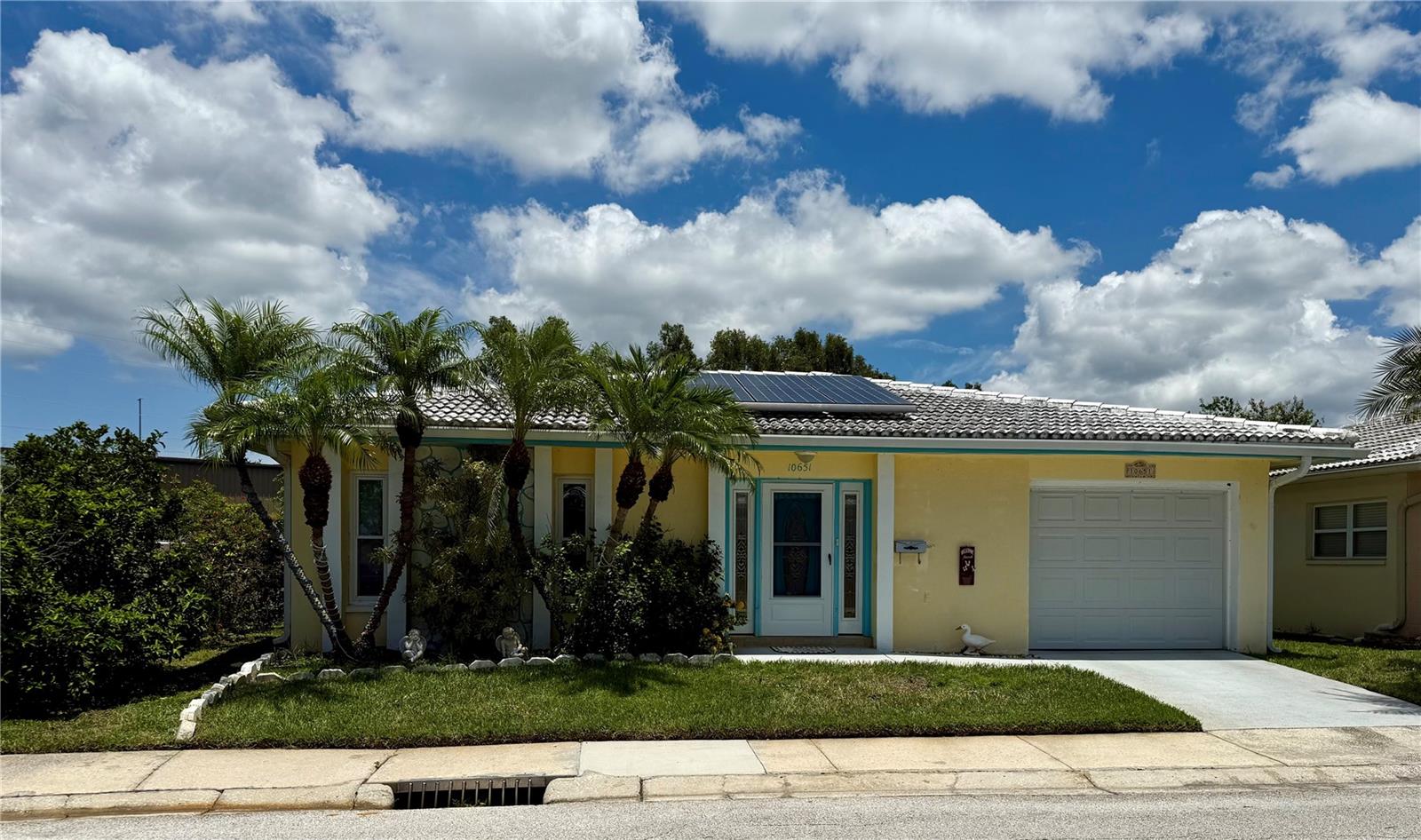 This adorable waterfront home is a perfect retirement sanctuary! Just minutes away from all the major highways, shopping centers, restaurants and medical facilities. This gem is nestled among the lush tranquil landscape with waterfront so you can sit on the patio and fish or enjoy all the beautiful views! This 55+ community is pet friendly along with many other amenities to enjoy such as a heated pool, clubhouse, fitness room, shuffleboard and much more! Spacious two bedroom villa has two full baths with lots of closet storage space, layout offers privacy but has an open floor plan as well with plenty of space for entertaining family and friends! This home has solar which provides homeowner a low electric bill. It has a lease that can be assumable or can be paid with proceeds depending on buyers preference. has a 1 car garage with lots of extra storage space and a washer/dryer included in sale, If you are looking for an affordable home in paradise to accommodate your active lifestyle...look no further! This home is sold partially furnished so just pack your suitcase!
