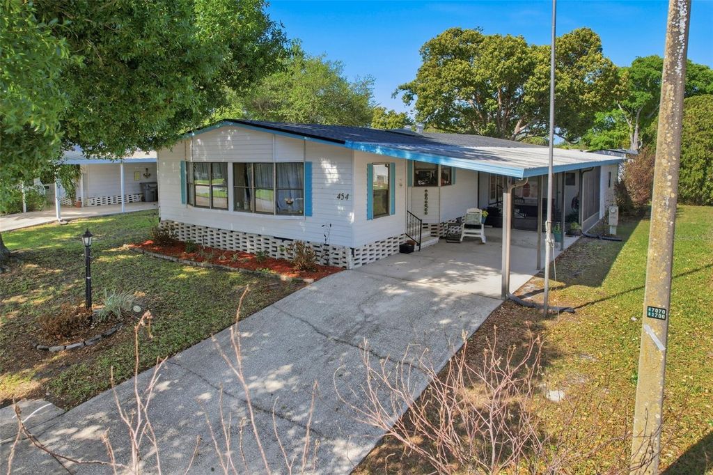 Photo of 454 Village Circle SW, Winter Haven, FL 33880 (MLS # L4960932)