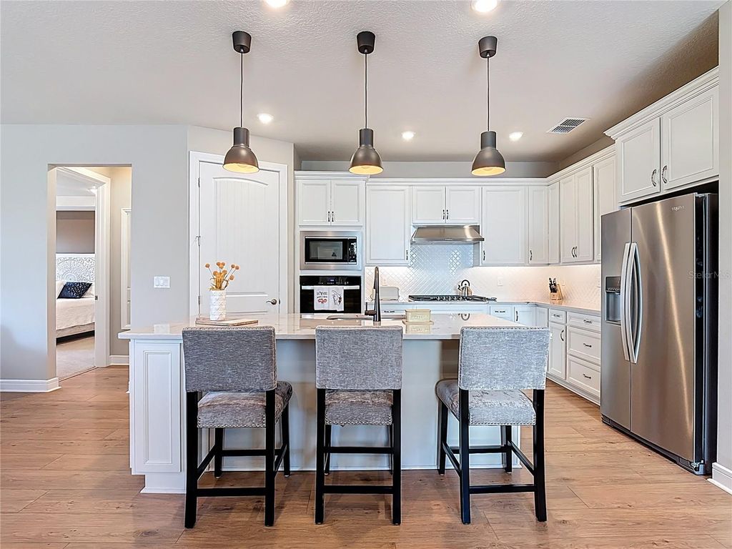 Photo of 6362 Shimmering Shores Lane, Saint Cloud, FL 34771 (MLS # O6384729)