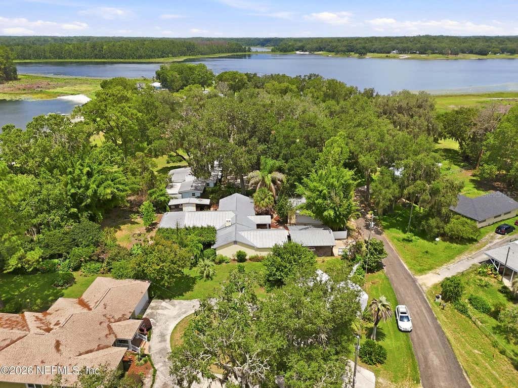 Photo of 7932 Breezy Point Road W, Melrose, FL 32666 (MLS # O6431557)