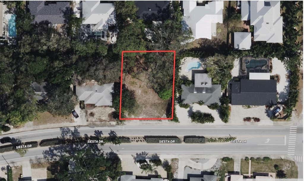 Photo of 1871 Siesta Drive, Sarasota, FL 34239 (MLS # A4703295)