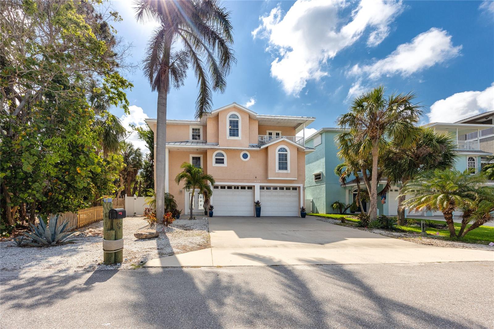 Elevated Move-In Ready Pool home with Water Views. This elevated 4-bedroom, 2.5-bath pool home is a rare opportunity for buyers seeking move-in ready elevated for added flood protection and lower insurance costs, this well-maintained residence offers peace of mind and resort-style living just minutes from award-winning beaches and boating. Access the main living level through your own private custom elevator, where you're welcomed into an open-concept floor plan featuring soaring ceilings, gleaming maple hardwood floors, and a spacious great room filled with natural light. The heart of the home is the beautifully gourmet kitchen, complete with Granite countertops and solid maple wood cabinetry. Stainless steel appliances. Oversized tile flooring and two dining areas for casual or formal entertaining. The primary suite is located on the main level and features a custom walk-in closet and a luxurious en-suite bathroom with a Jacuzzi tub, glass-block walk-in shower, double vanities, and cultured marble finishes. Upstairs, the third level offers three well-sized guest bedrooms, all with generous closet space. Two bedrooms share access to a private balcony with peek-a-boo water views, a highly sought-after feature in this elevated Tierra Verde location. Step outside to enjoy your own tropical oasis featuring a saltwater pool with sun shelf, dual swim-outs, waterfalls, and fountains. Covered lanai and fully fenced backyard, ideal for entertaining or relaxing. Professionally landscaped yard with lush tropical foliage Additional upgrades and features include Massive 1,300 sq ft 4+ car garage with two 9-ft tall garage doors and smart LiftMaster openers. Abundant storage space for recreational gear or workshop needs. 2024 Upgraded Standing Seam Metal Roof, Brand new leaded glass steel double front door, Dual-zone HVAC with smart thermostats (both systems replaced in 2015) Perfectly located on the island of Tierra Verde, this home provides convenient access to Fort De Soto Park, downtown St. Petersburg, I-275, marinas, dining, and top-rated Gulf beaches. Just 15 minutes from downtown St. Pete and 25 minutes from Tampa International Airport.