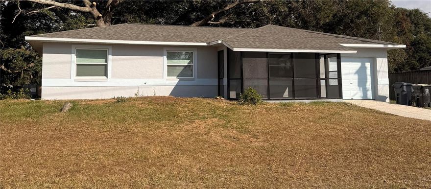 Welcome home to this completely remodeled 3/2. Located in Bartow, FL. This home sits on a nice open lot with almost a 1/4 acre of land. The home has been completely remodeled. New galley style Kitchen with quartz countertops and stainless steel appliances. The bathrooms also completely remodeled with tile flooring. New interior and exterior paint, New roof, windows, A/C and duct work and electric water heater as well as new laminate throughout the house and tile flooring in the Kitchen and bathrooms. The home also has a screened in front porch and a nice open big backyard.