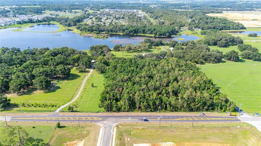 Exceptional opportunity in highly-desirable Dade City! Discover the perfect blend of natural beauty and development potential with this 8.44-acre parcel of greenbelted land in the heart of Central Florida. Currently used for timber under agricultural exemption, this expansive property offers a serene setting with a picturesque lake view of Suwannee Lake.
Zoned Residential-1 (R1), this land allows for single-family homes and duplexes, making it an exceptional opportunity for residential development. With public utilities nearby, the groundwork is laid for future expansion. Property features 606 ft of road frontage on Saint Joe Road.
Whether you're looking to build a private estate, create a small residential community, or hold for investment, this property is a rare find in a fast-growing area. Enjoy the peaceful rural surroundings while still being conveniently close to all that Dade City and the surrounding region have to offer.