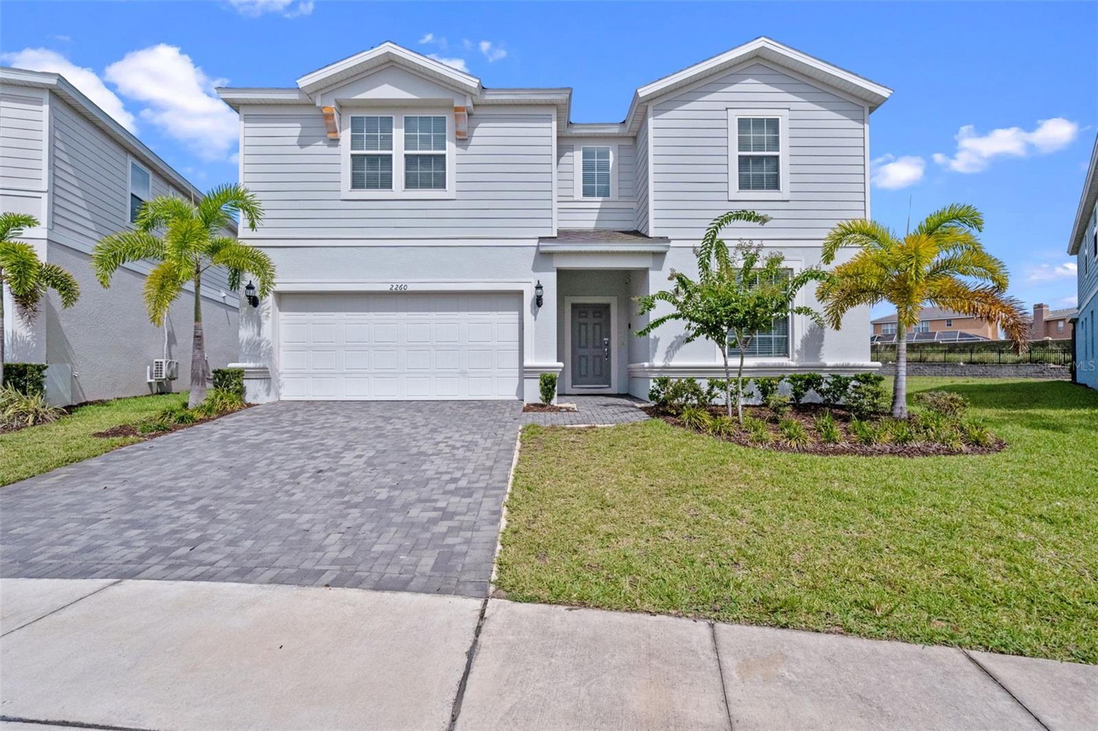 Luxurious and fully furnished 10-bedroom, 8-bathroom vacation home with private pool and spa, located in the highly sought-after gated community of Windsor Island Resort, just minutes from Disney. This exceptional short-term rental property offers a strong 68% occupancy rate and is professionally managed by a Superhost with over 100 reviews, making it an ideal turnkey investment with consistent income potential.
Inside, the home features beautifully styled King Rooms and themed bedrooms inspired by Toy Story and Dumbo, designed to attract guests of all ages. The open-concept layout includes spacious living and dining areas, a chef’s kitchen with stainless steel appliances, and sliding doors leading to a screened lanai and expansive pool deck. The oversized lot provides ample space for outdoor enjoyment, and the covered lanai is perfect for year-round entertaining.
The kitchen is equipped with a refrigerator featuring an ice maker and water dispenser, glass cooktop range, microwave, dishwasher, and generous storage. The large combined kitchen, dining, and gathering areas create a warm and welcoming space ideal for families and larger vacation groups. This is the perfect place for entertaining, informal dining and planning the days activities.
Located in Windsor Island Resort, residents and guests enjoy world-class amenities including a zero-entry heated pool, lazy river, dual water slides, splash pad, fitness center, mini golf, game room, sand volleyball and basketball courts, poolside bar, private cabanas, and 24-hour guarded gate. With a strong rental history, professional management, and future bookings already in place, this home offers a rare blend of lifestyle and investment in one of Central Florida’s top-performing vacation communities.