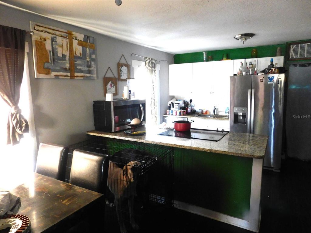 Photo of 8412 N Seminole Avenue, Tampa, FL 33604 (MLS # TB8479093)