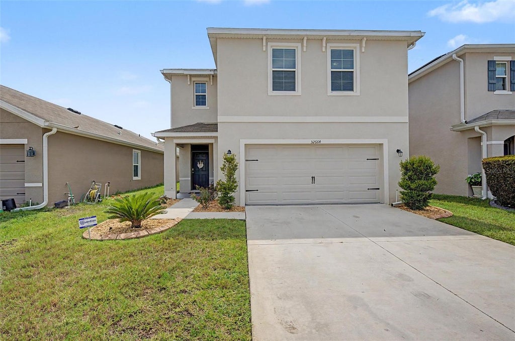 Photo of 32664 Dashel Palm Lane, Wesley Chapel, FL 33543 (MLS # TB8548289)