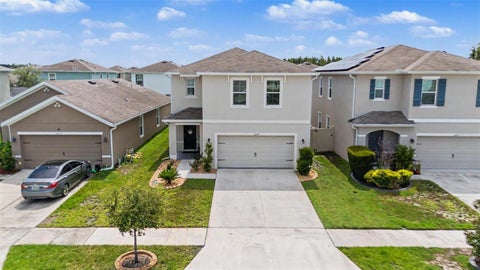 Photo of 32664 Dashel Palm Lane, Wesley Chapel, FL 33543 (MLS # TB8548289)