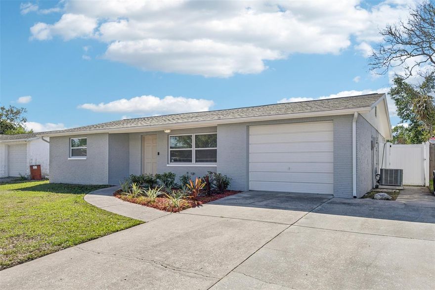 Wow!  Looking for an exceptional value?  Every major component at 9041 Lido Lane has been updated, making this a home that will provide enduring quality and real peace of mind with all its wonderful improvements.  It is move-in-ready with a newer shingle roof (Jan 2024), a reliable 3-ton Ameristar HVAC system (2018), and New (Jan 2026) American Craftsman Low-E Argon dual pane windows for maximum efficiency and comfort.  The interior has been entirely revamped, offering a gourmet kitchen equipped with all-new granite counters and Shaker cabinetry, a new Stainless GE Range, a new GE Energy Star Dishwasher, and a new gleaming stainless-steel sink with matte black fixtures.  Both bathrooms have been fully renovated as well, featuring contemporary fittings, new vanities, and a luxurious soaking tub.  Spanning the entire home, the contemporary luxury vinyl flooring flows through the main living and dining area, the 3 generous bedrooms, and both bathrooms.  Every feature has been addressed, including a detailed electrical safety inspection, installation of new interior and wardrobe doors, fresh interior and exterior paint, new window coverings, updated lighting, and all new ceiling fans, as well as new rain gutters and downspouts.  Situated outside of a flood zone and featuring a sunny enclosed lanai that looks out to the large, fully fenced backyard. This residence offers the ultimate Florida lifestyle just minutes from shopping, dining, and pristine Gulf beaches. Nothing to do but move in.  Schedule your showing today!