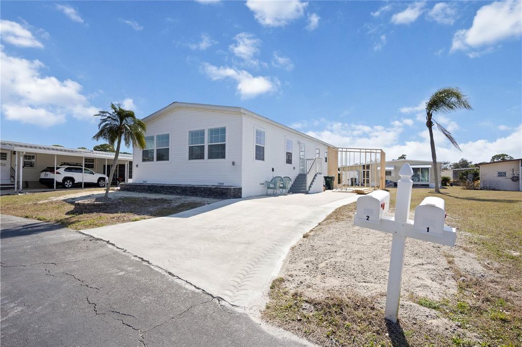 Photo of 2 S Botany Bay Circle, Englewood, FL 34223 (MLS # A4683351)