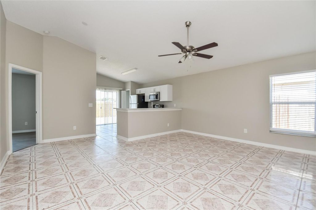 Photo of 1639 Ridge Pointe Drive, Orlando, FL 32808 (MLS # O6384024)