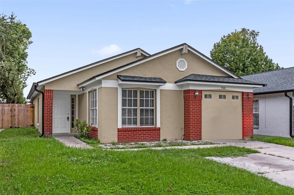 Photo of 9928 Dean Cove Lane, Orlando, FL 32825 (MLS # O6449493)