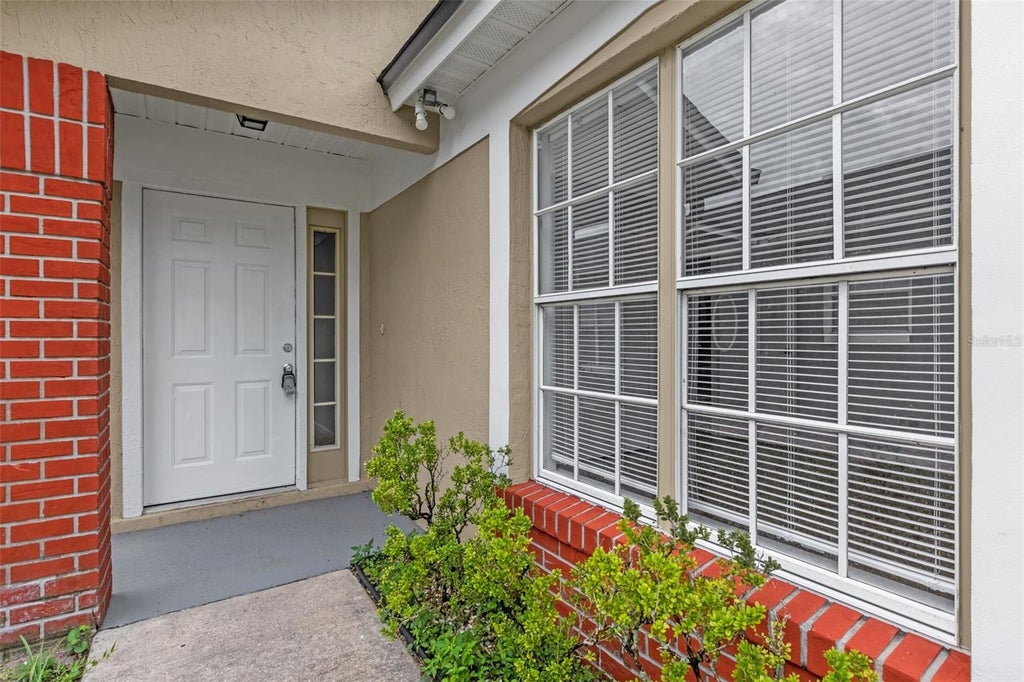 Photo of 9928 Dean Cove Lane, Orlando, FL 32825 (MLS # O6449493)