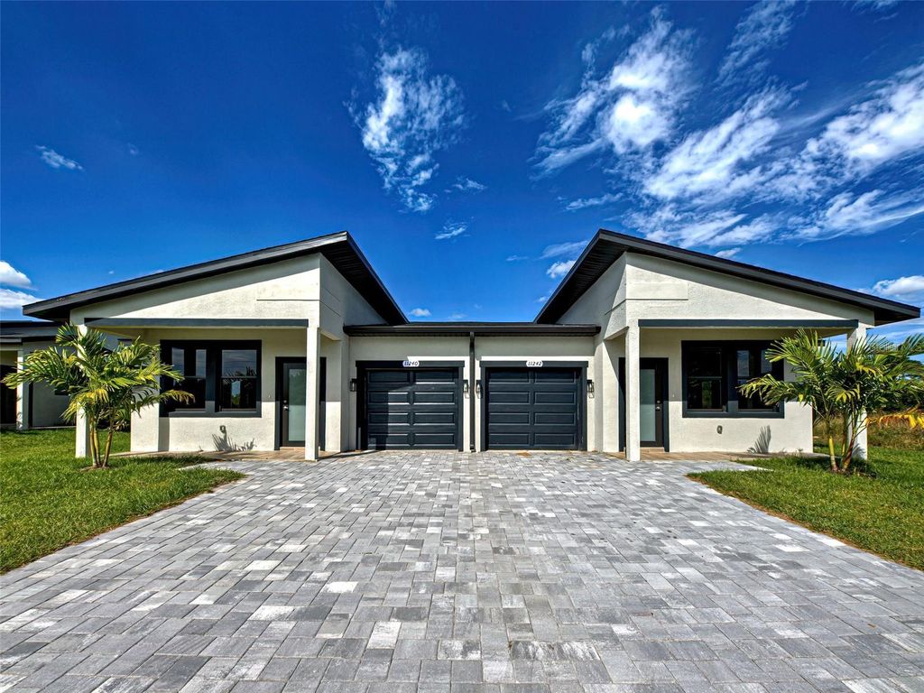 Photo of 11240 Kimberly Avenue, Englewood, FL 34224 (MLS # C7517402)