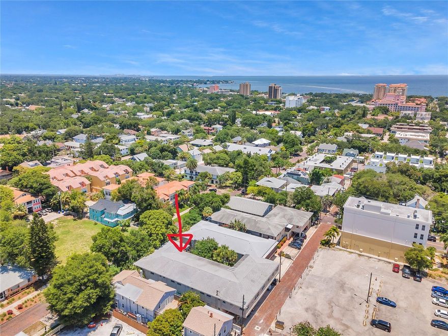 This TOTALLY updated light and bright 1bed/1bath condo with COVERED EV parking spot #10, has finishes that are unique, classy and TOP of the line, the location in downtown Old NE is only steps from Beach Dr, with parks, museum, new Pier, restaurants and SO much more !!! The upgrades are Unbelievable : from micro cement floors, to energy saving impact windows, voice activated lights and fans, 220V electric car charger in parking spot 10. The kitchen appliances are outstanding, with quartz countertops, floating shelves and wine racks, Bertazonni Italian induction stainless steel range, Fotile stainless range hood, Rachiele custom stainless steel sink, Fisher Paykel refrigerator, Thermador dishwasher, Miele heat pump washer and dryer, SioGren tankless water heater, Daikin high efficiency mini splits, Florida Water Systems salt-free whole house water filter system and salt-free water softener, Hansgrohe shower system with air massage, and Bidet toilet! The bathroom is breathtaking, check out the pictures, words cannot describe, let me show you your new home ! Available June first 2026!