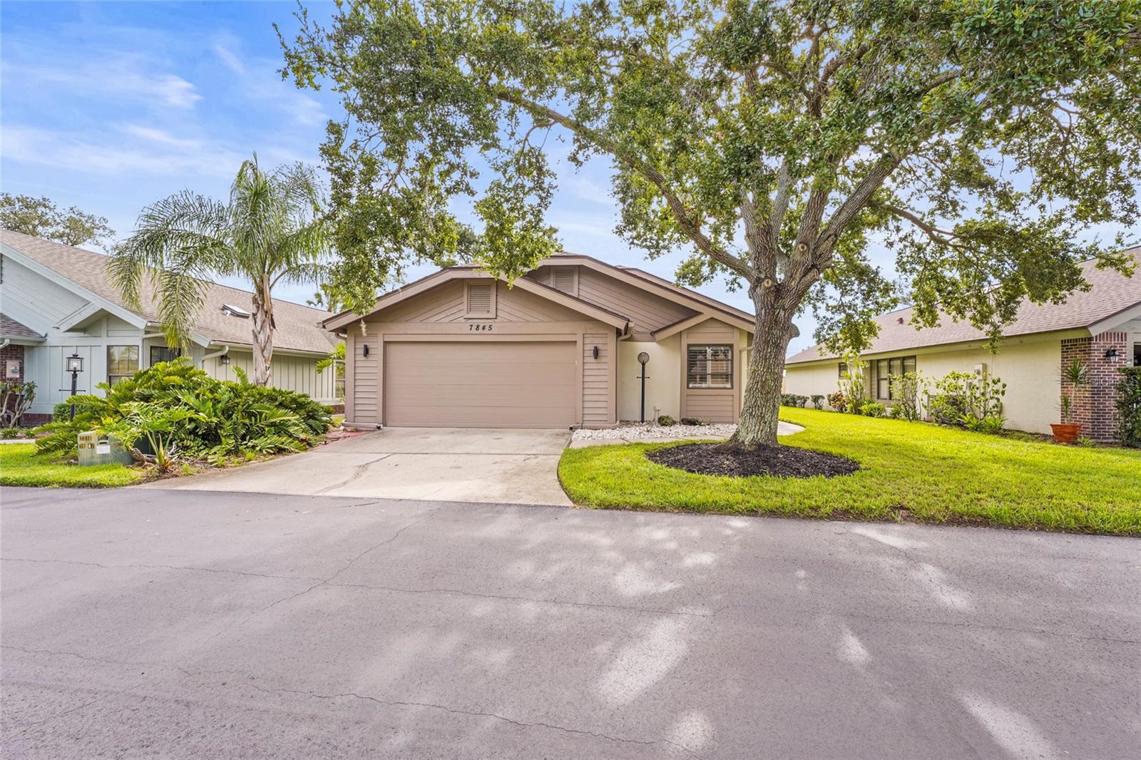 Enjoy the ease of maintenance-free living in the highly desirable Pine Trace community at Palm Aire.
This beautifully updated 2-bedroom, 2-bath residence with a 2-car garage offers nearly 1,650 sq. ft. of thoughtfully designed living space.
Inside, soaring vaulted ceilings and skylights fill the home with natural light. The chef’s kitchen features granite countertops, Sub-Zero refrigeration, Bosch dishwasher, custom pull-out storage solutions, and designer lighting—perfect for both everyday living and entertaining. The spacious primary suite offers dual closets and a spa-inspired bathroom with a zero-entry walk-in shower, granite vanity, and abundant natural light.
Step outside to the fully screened lanai, where new tile flooring, dimmable lighting, and multi-speed ceiling fans create an inviting retreat for morning coffee or evening gatherings. Additional upgrades include a new water softener with chlorine filtration, ADT security wiring, new flooring throughout, and a split floor plan that provides privacy for guests.
Living here means more than just a home—it’s a lifestyle. Residents of Pine Trace enjoy beautifully maintained surroundings with optional Palm Aire Country Club membership, offering golf, tennis, swimming, fitness, and dining. All of this is just minutes from University Town Center, Lakewood Ranch, downtown Sarasota, and the world-famous Gulf beaches. Pine Trace HOA takes care of exterior maintenance, roof replacement, and lawn care—giving you true peace of mind. Plus, cable, internet, and even streaming services are included in your dues. It’s all the convenience of condo living, paired with the privacy and comfort of your own stand-alone home.
Modern updates, peace-of-mind features, and the best of Florida living come together in this exceptional home. Schedule your private showing today!