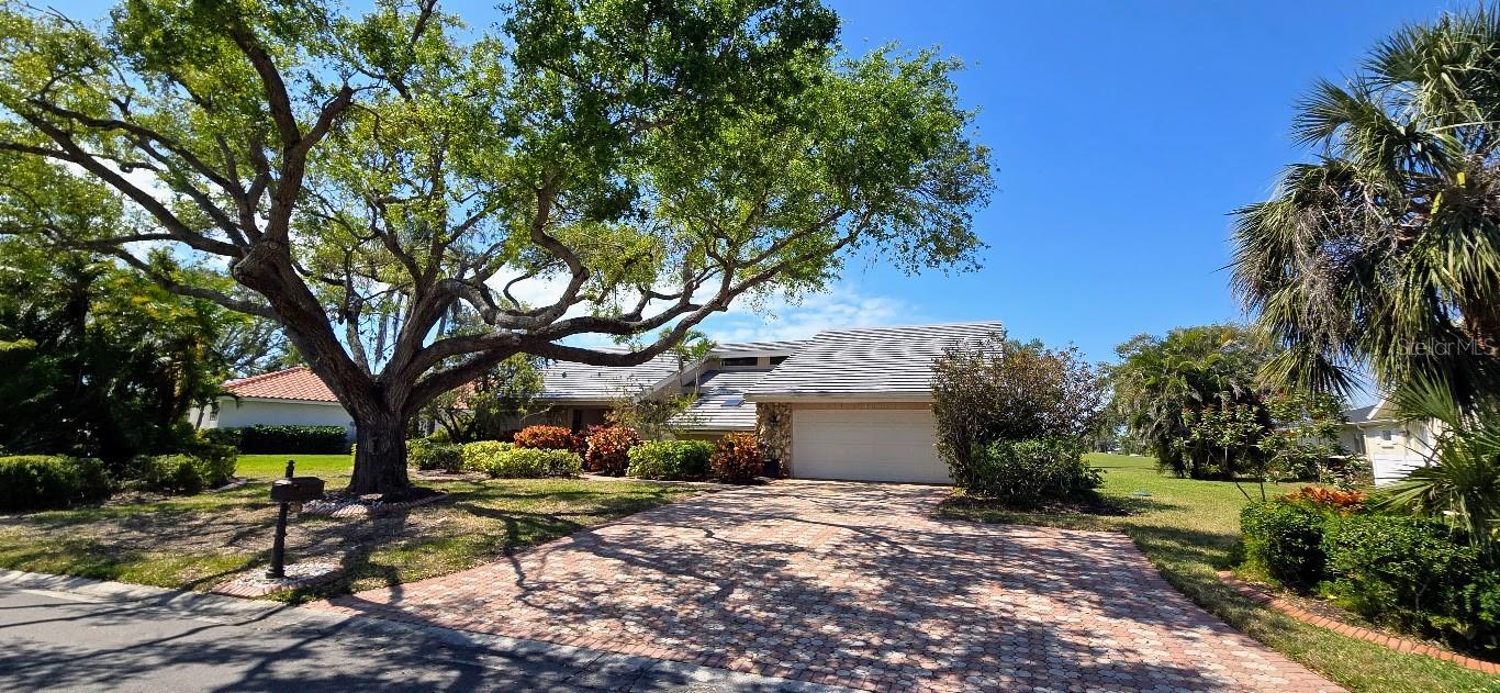 Are you looking for a spacious pool home in a gated community? This is the one! 4 bedrooms, 3 bathrooms, 2-story pool home, overlooking golf course and a pond, just under 3,500 sq ft under air is in the very popular guard gated Country Club of Sarasota, with easy access to Beneva Rd, Clark Rd and Tamiami Trail and within a few miles to beautiful beaches of Siesta Key.
Thoughtfully laid out, this house was completely remodeled a few years back and it features a grand foyer with a large master bedroom and ensuite bathroom on the left side of the house with 2 walk in closets, beautifully finished bathroom with gorgeous tub and separate walk in shower; formal living room, separate dining room, spacious kitchen with modern European style cabinets, massive family room with wood burning fireplace and vaulted ceilings with decorative beams, and the second bedroom with completely remodeled bathroom, all on the first floor. Other features include a convenient laundry room with sink and storage shelves, oversized garage with room for 2 cars and extra space for storage. On the second floor, one of the 2 bedrooms there is overlooking the golf course and pond. Beautiful sunsets and views from here will make this room one of your favorite rooms in the house. The other bedroom is very spacious and tucked away from the first one and they share one bathroom accessible from the first bdrm and from the hallway. The sparkling pool and covered lanai will have you wanting to spend all your free time relaxing and taking in the beautiful surroundings. Come and see this fantastic home in an established neighborhood with A rated schools. Membership to a club is optional, but if interested, there is golf, fitness, and tennis. This is a must-see property, you won't be disappointed. Available now, unfurnished, subject to owner and HOA approval application approval with paid fee. Lawn, Pool and Pest service is included in rent. 1 dog is permitted with paid pet deposit and owner's approval of the size and breed.