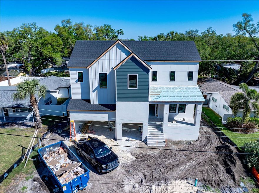 Under Construction. Under Construction: Estimated Completion is May 2026:  

The Madeira A Floorplan by Homes by WestBay is a stunning two-story luxury residence designed to offer both elegant living and exceptional functionality. With approximately 4,500+ square feet of living space, this thoughtfully designed home features five spacious bedrooms and four and a half bathrooms, providing ample room for family and guests alike. The open-concept layout creates a seamless flow between the main living areas, highlighted by a dramatic foyer, formal dining space, and a grand living room that opens beautifully into the heart of the home.

At the center of the home is an expansive chef’s kitchen, complete with a large island, abundant cabinetry, and generous workspace—perfect for both everyday living and entertaining. The kitchen connects effortlessly to the main gathering areas, making it easy to host family dinners or larger gatherings. Upstairs, the private owner’s retreat offers a luxurious escape with spacious closets and elegant finishes, while additional bedrooms and flexible living areas provide comfort and privacy for everyone in the household. Upstairs also features an oversized bonus room and balcony. 

Outside, this home truly shines with an oversized covered lanai, and resort-style pool and hot tub, creating the perfect Florida outdoor living experience. Located in the heart of South Tampa, the property offers convenient access to the scenic waterfront of Bayshore Boulevard, along with nearby shopping, dining, and entertainment. With close proximity to Tampa International Airport, this home blends luxury, lifestyle, and location—making it an exceptional opportunity to enjoy upscale living in one of Tampa’s most desirable areas.

Estimated Completion: May 2026