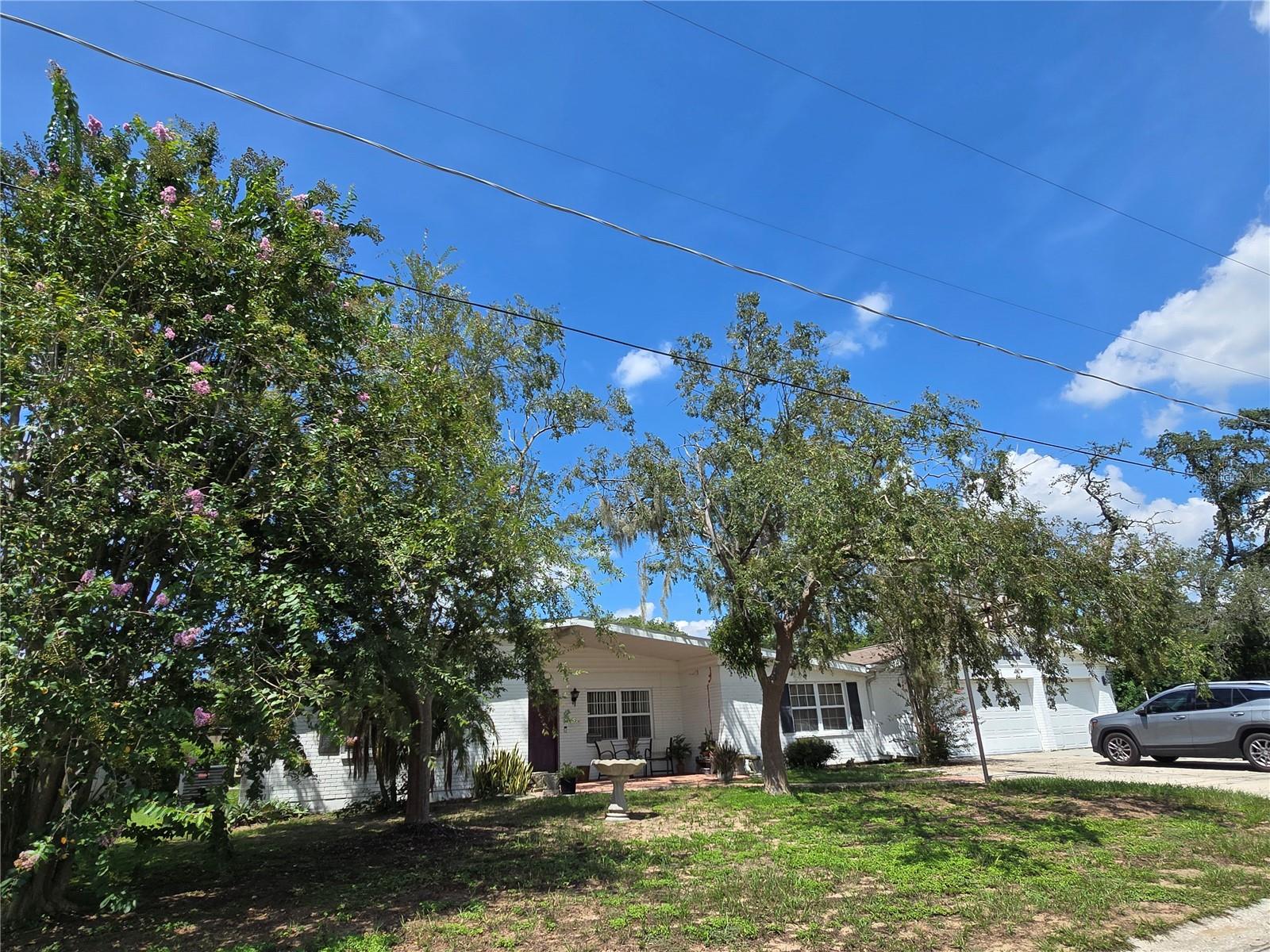 Bring ALL Offers! Property is in need of repairs and tlc but has strong bones, sits on an over-sized lot and has an attached over-sized garage that can fit 9 cars, an exterior storage she back and front patios and space to run! Make this home your today!